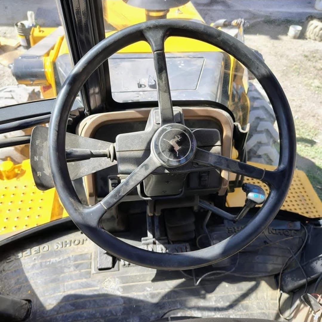 Retroexcavadora 310SE, John Deere, 2000.